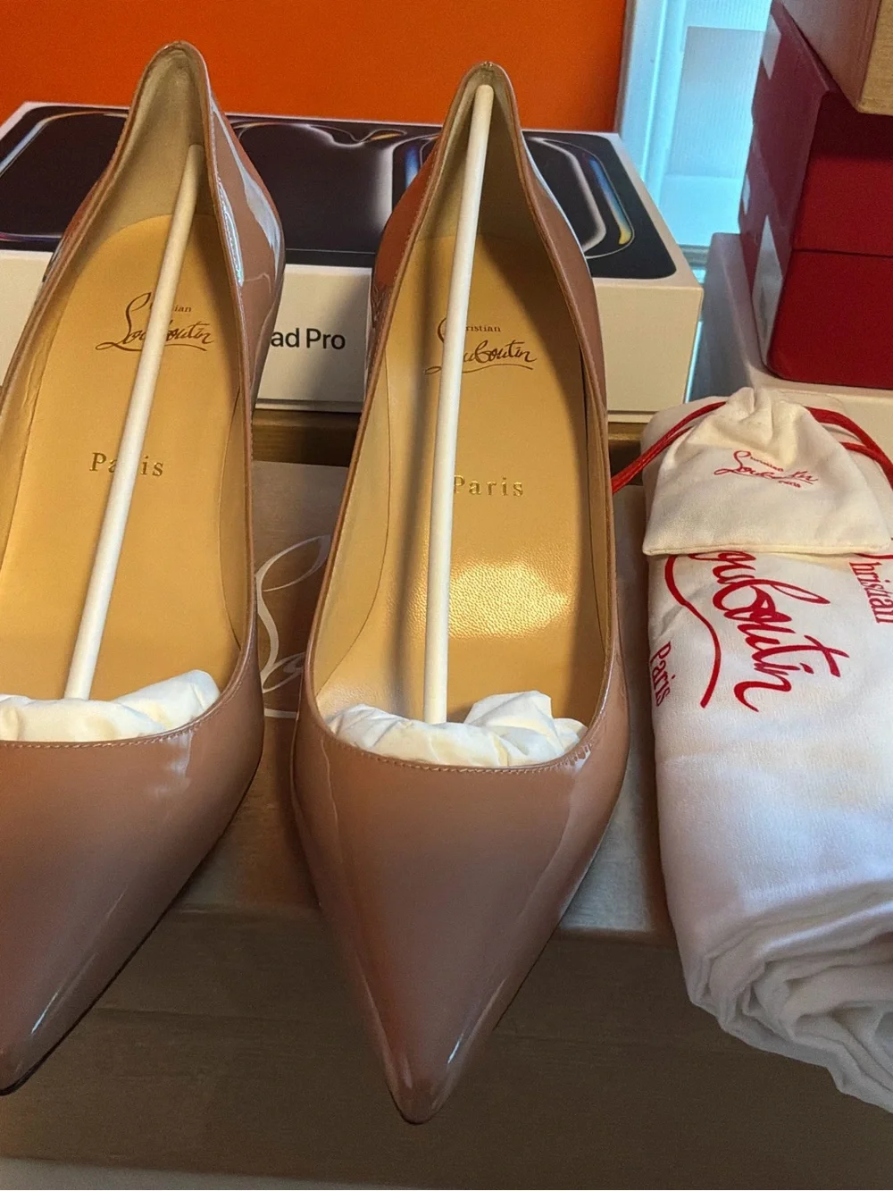 Christian Louboutin Nude Patent Pointed-Toe Pumps with Red Sole